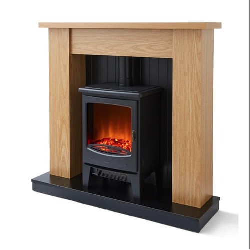 1025 - A Warmlite electric heater in the style of a wood burning stove with a wood effect fire surround app... 