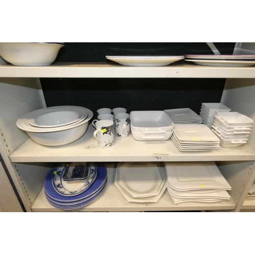 4031 - A quantity of miscellaneous plain white and other blue decorative dinnerware (4 shelves)