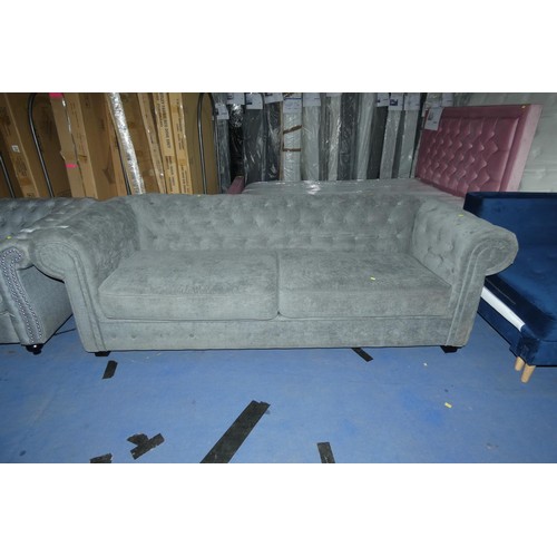 1383 - A grey upholstered button back sofa approx 220 cm wide