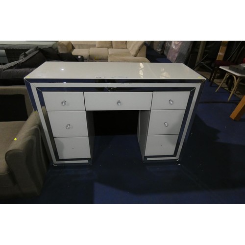 1414 - A glass dressing table approx 125 x 45cm. Please note that the glass is cracked in two places on the... 