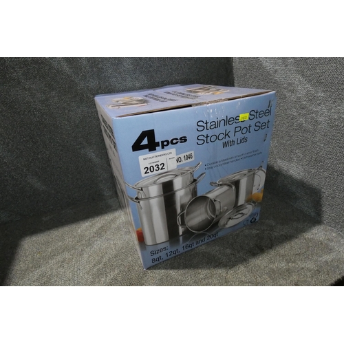 2032 - A boxed 4 piece stock pot set with lids