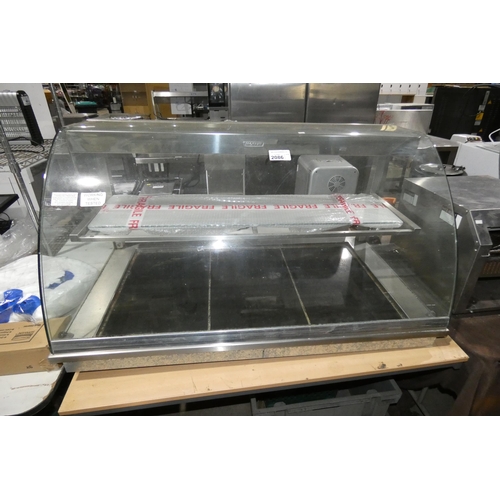 2086 - A commercial stainless steel integrated (drop in counter top) serve over, glass front, heat plate un... 