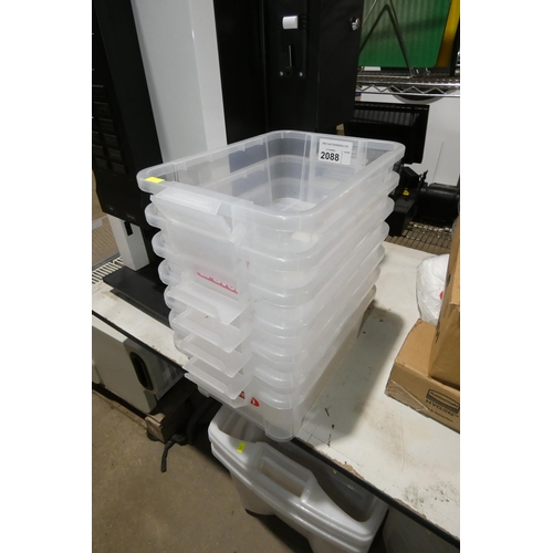 2088 - 7 small stacking plastic containers no lids