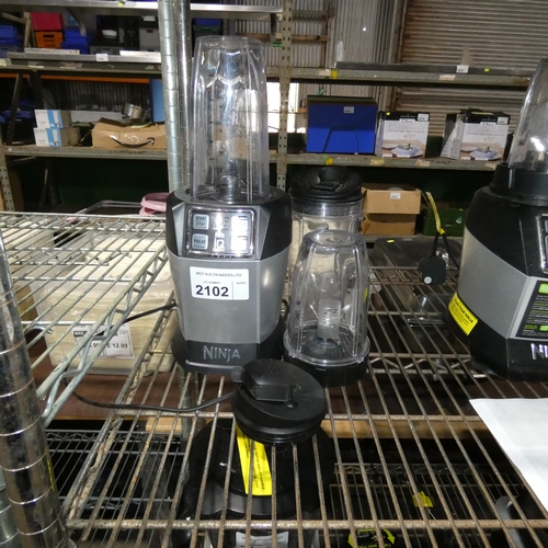 2102 - Withdrawn Please note this lot requires attention- A Ninja blender type Auto IQ 1000w comes with acc... 