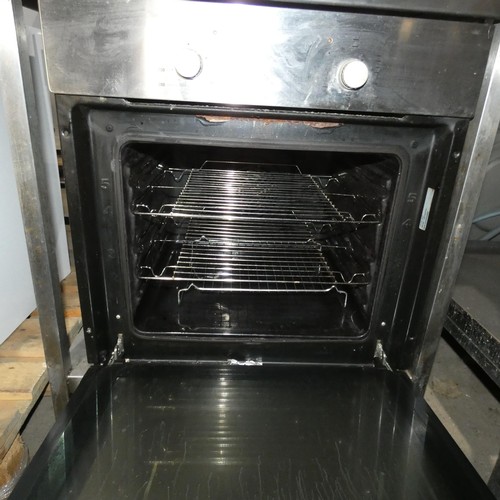 2139 - A drop front integrated fan oven by Logik and a commercial stainless steel catering type table with ... 