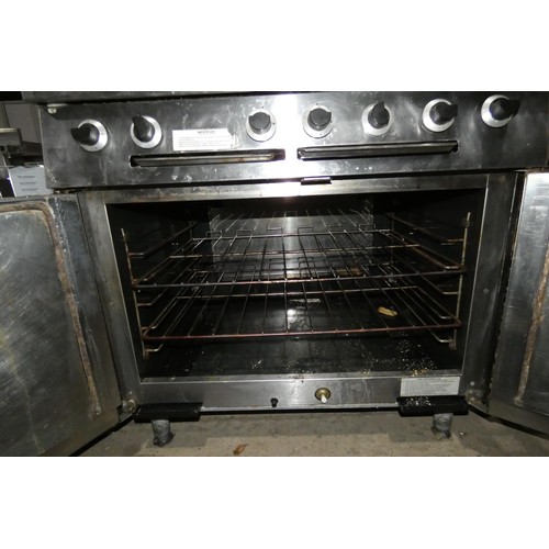 2174 - A commercial stainless steel 6 burner hob with oven beneath by Falcon, gas - trade