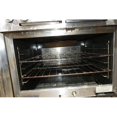 2174 - A commercial stainless steel 6 burner hob with oven beneath by Falcon, gas - trade