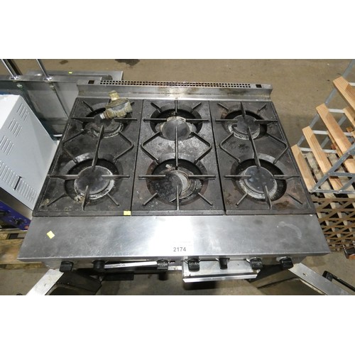 2174 - A commercial stainless steel 6 burner hob with oven beneath by Falcon, gas - trade