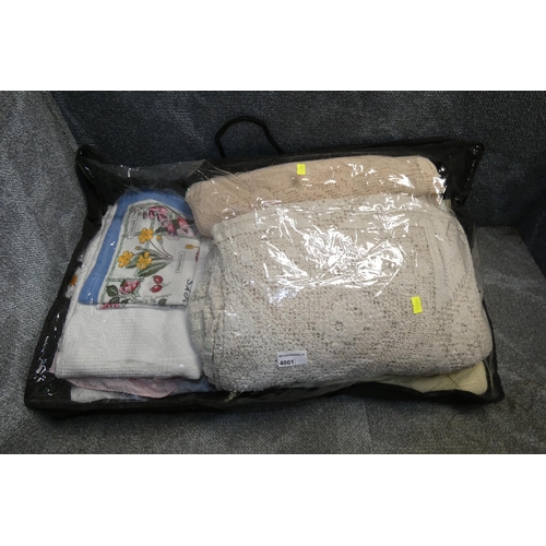 4001 - A quantity of miscellaneous decorative bed covers and other decorative fabrics etc