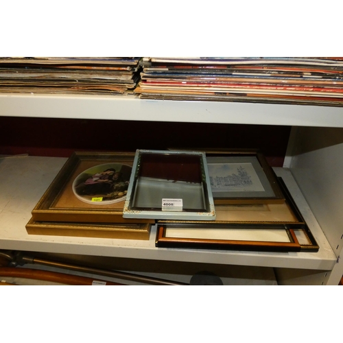 4008 - A small framed mirror and a quantity of miscellaneous framed pictures (half shelf)