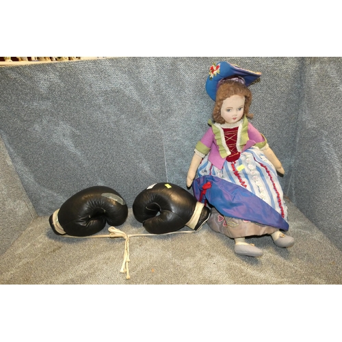 4035 - A pair of vintage boxing gloves and a ragdoll (one shelf)