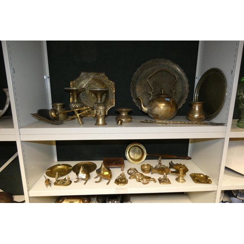 4048 - A large brass kettle, various large brass trays and a quantity of miscellaneous decorative brass war... 