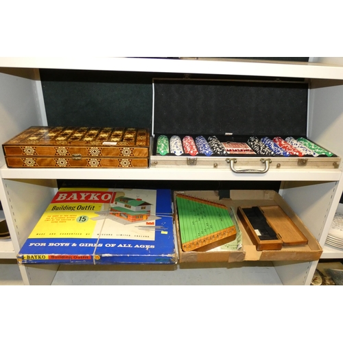 4050 - A vintage Bayko building set, vintage table harp, a set of vintage dominoes, an attache case contain... 