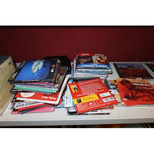 4006 - A quantity of miscellaneous DVDs & CDs (one shelf)