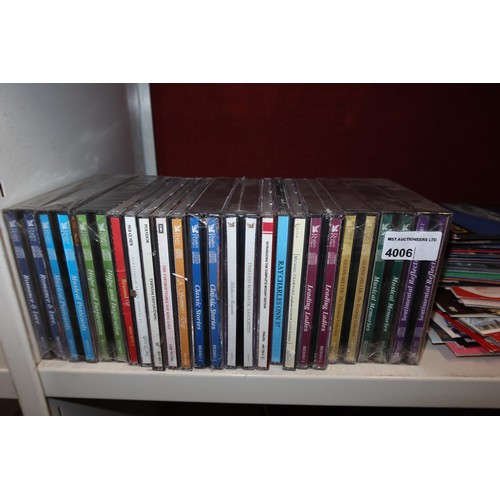 4006 - A quantity of miscellaneous DVDs & CDs (one shelf)