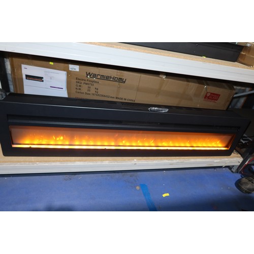 1016 - A Wyndham Wade Logan electric inset fire RRP £206. Tested Working