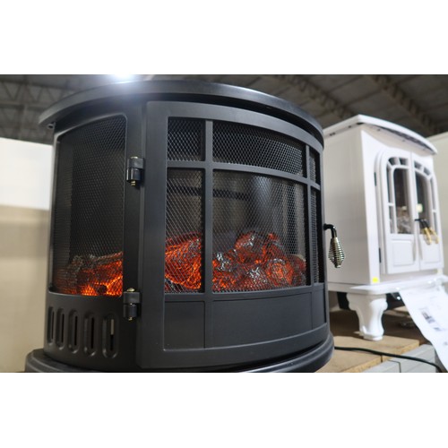 1008 - A Warmlite Bath 55.9cm w / 28 cm d electric heater in the style of a wood burning stove RRP £117.Tes... 