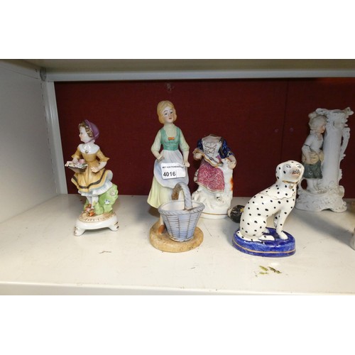 4016 - A quantity of miscellaneous decorative ceramic figures. Please note one of the figures has the head ... 