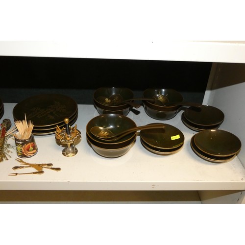 4053 - A quantity of miscellaneous wooden & lacquered oriental decorated dinnerware including; plates, bowl... 