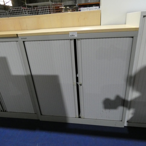 2283 - A Bisley grey metal tambour front storage cabinet with wood effect top approx 100 x 49 x 104cm high