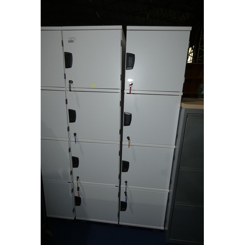 2295 - 2 x light grey four person / four door personnel lockers each approx 40 x 40 x 164cm high and each c... 