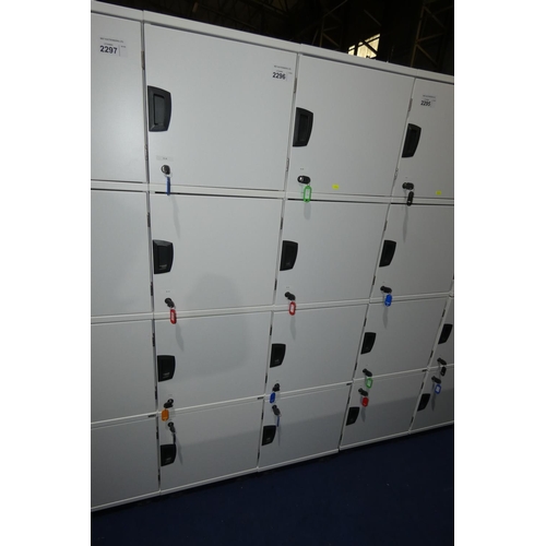 2296 - 2 x light grey four person / four door personnel lockers each approx 40 x 40 x 164cm high and each c... 