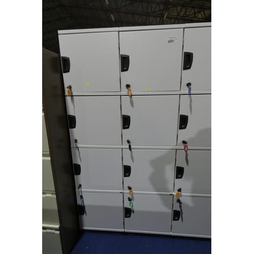 2297 - 2 x light grey four person / four door personnel lockers each approx 40 x 40 x 164cm high and each c... 