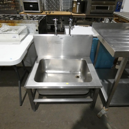 2187 - A low commercial stainless steel sink with splash back panel, approx 76x62x100cm inc taps, sink is 4... 