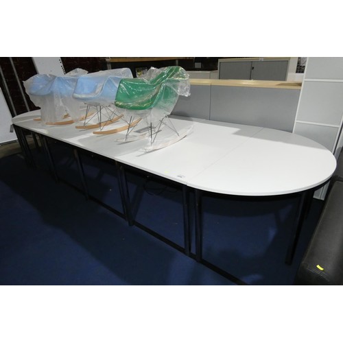 2319 - A white oval six section meeting room table overall approx 450cm x 150cm comprising 4 x rectangular ... 