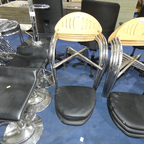 2349 - 4  x metal framed stacking chairs with bent wood backs and black seat pads. Please note that the sea... 