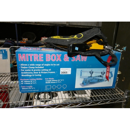 3065 - A mitre box with saw and a high security steering wheel lock supplied with a key