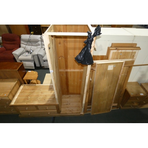 3127 - A pine wardrobe which requires reassembly