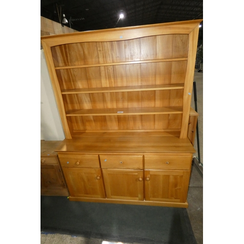 3129 - A wooden two piece dresser with open shelves above and 3 drawers / 3 doors below, approx 144cm wide.... 