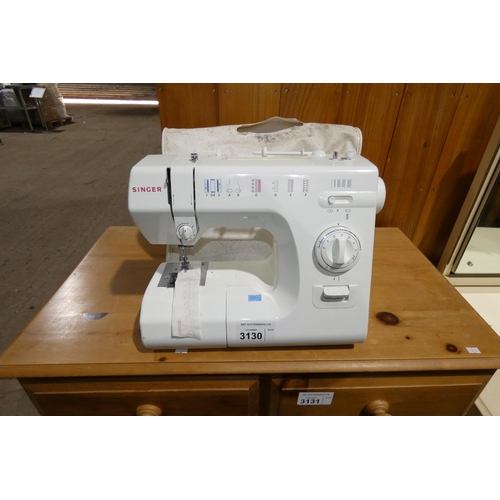 3130 - A Singer MCPK sewing machine. Please note that no foot pedal / power lead is included (Trade)