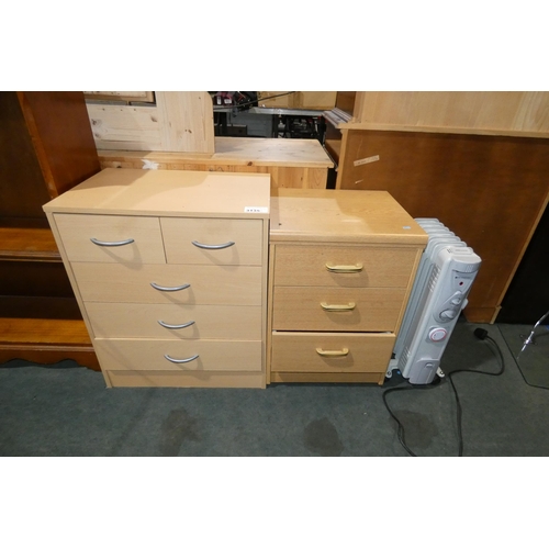 3135 - An electric heater by Heatstore 240v, a wood effect chest of 2 short / 3 long drawers approx 60cm wi... 