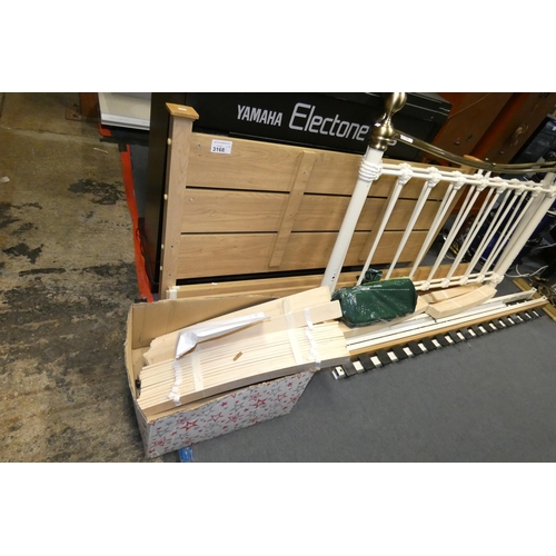 3168 - A wood effect bed frame 4ft 6inch. Requires assembly and no mattress is included