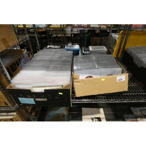 3229 - 2 boxes containing a quantity of various 7 inch vinyl records. Not practical to list in detail so pl... 