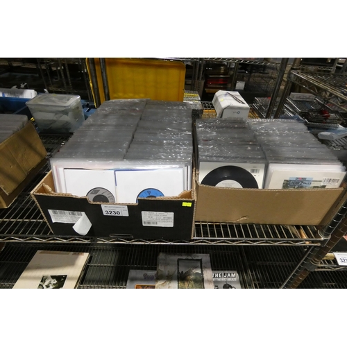 3230 - 2 boxes containing a quantity of various 7 inch vinyl records. Not practical to list in detail so pl... 