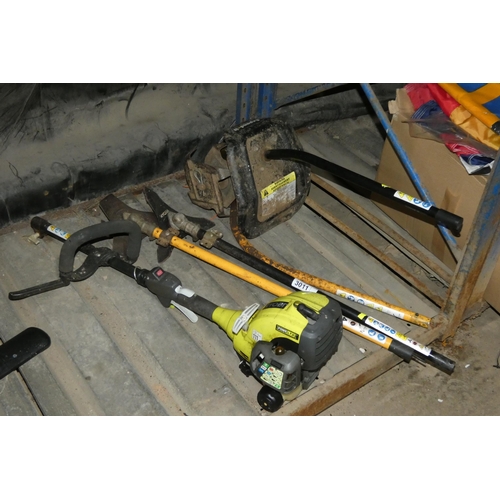 3011 - A Ryobi petrol engine garden tool with 4 x interchangeable implements comprising 1 x tiller, 1 x str... 