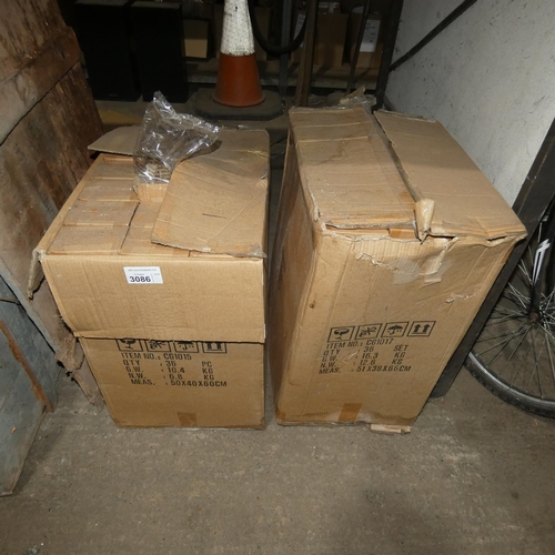 3086 - 2 boxes containing a quantity of novelty tins