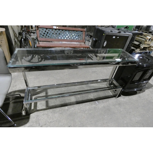 3095 - A metal / glass hall table approx 140 x 35 x 76cm high