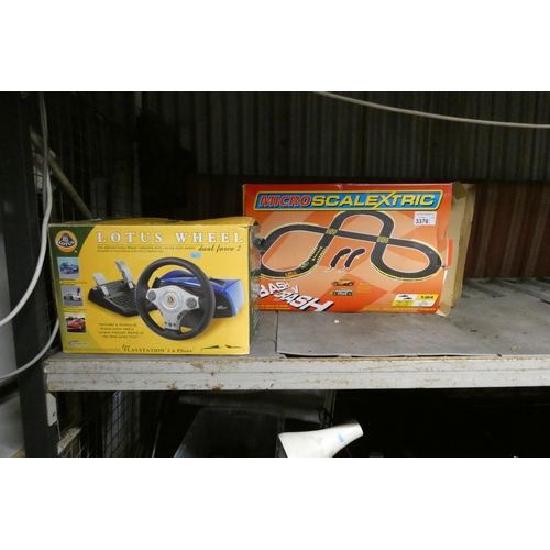 3378 - A PS2 steering wheel by Gamester type Lotus and a Micro Scalextric Bash N Crash - trade