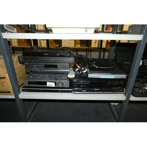 3435 - A quantity of various electronic related items including DVD players, cd players, a record player et... 