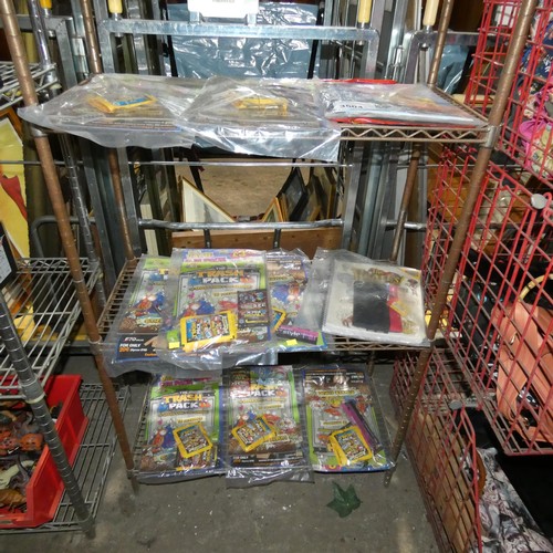 3504 - A quantity of various magazine packs including the trash pack with trading cards, colouring books et... 