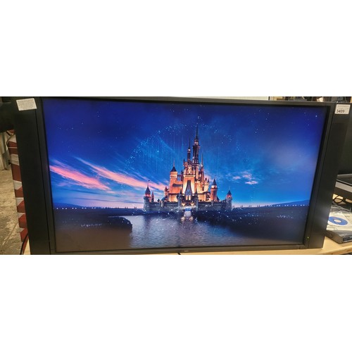 3409 - A 52 inch computer monitor by NEC type LCD5220 comes with Freeview box, remote control, no stand - t... 