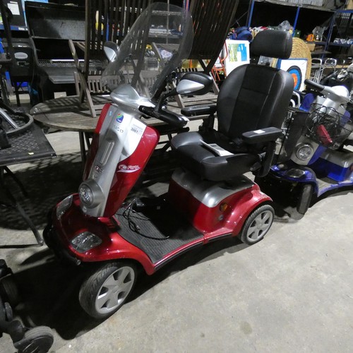 3061 - A Kymco ForU battery powered mobility scooter type Maxi XLS, supplied with a mains battery charger a... 