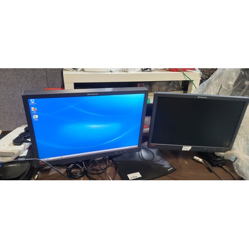 3369 - A twin monitor stand with 2 various Lenovo Think Vision monitors - trade