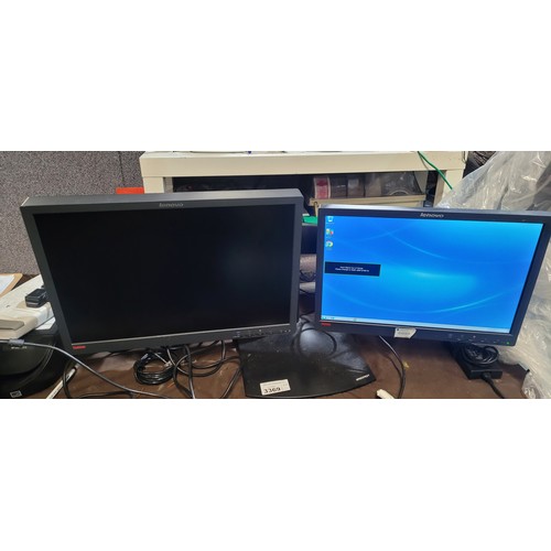 3369 - A twin monitor stand with 2 various Lenovo Think Vision monitors - trade