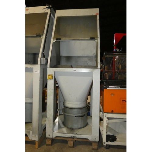 5046 - A metal workers fettling extraction booth fitted with a light that requires attention (SP020213)