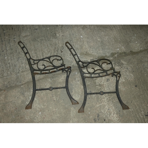 5076 - A pair of metal garden bench ends